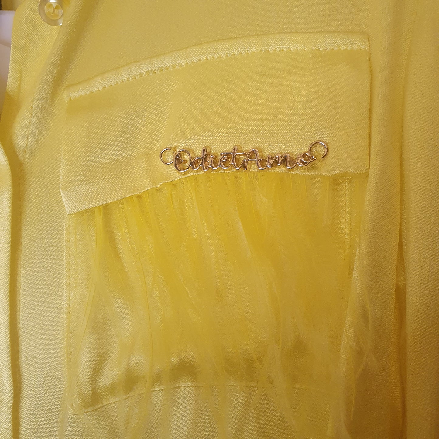 Camicia piume gialla