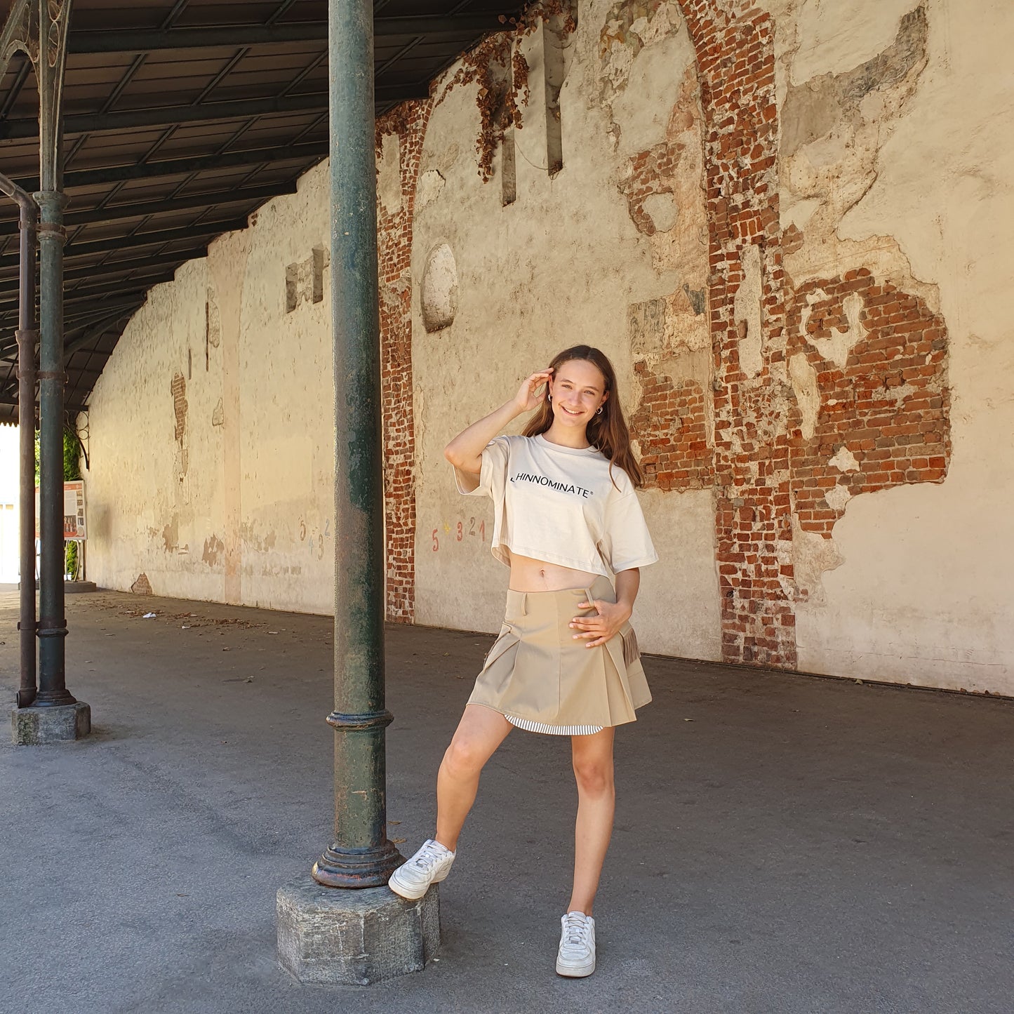 Gonna con tasche e frange beige