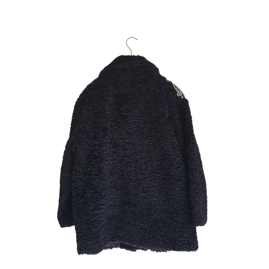 Ecopelliccia nera con patch