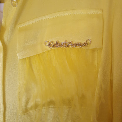 Camicia piume gialla