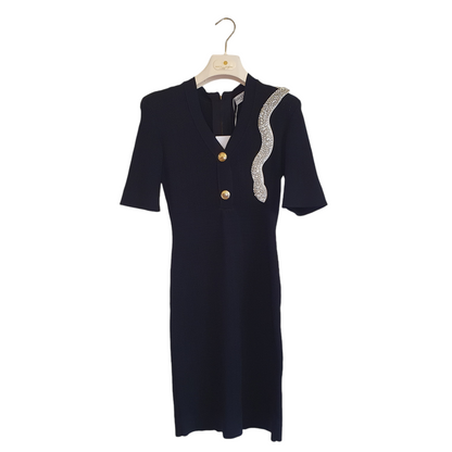 Abito nero da donna con zip e applicazione gioiello, elegante e sofisticato, perfetto per un evento a Fossano
