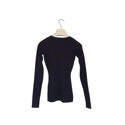 Maglia in viscosa a costine stretch da donna, adatta per abbinamenti casual o chic, perfetta per ogni stagione. Venduta a Fossano.