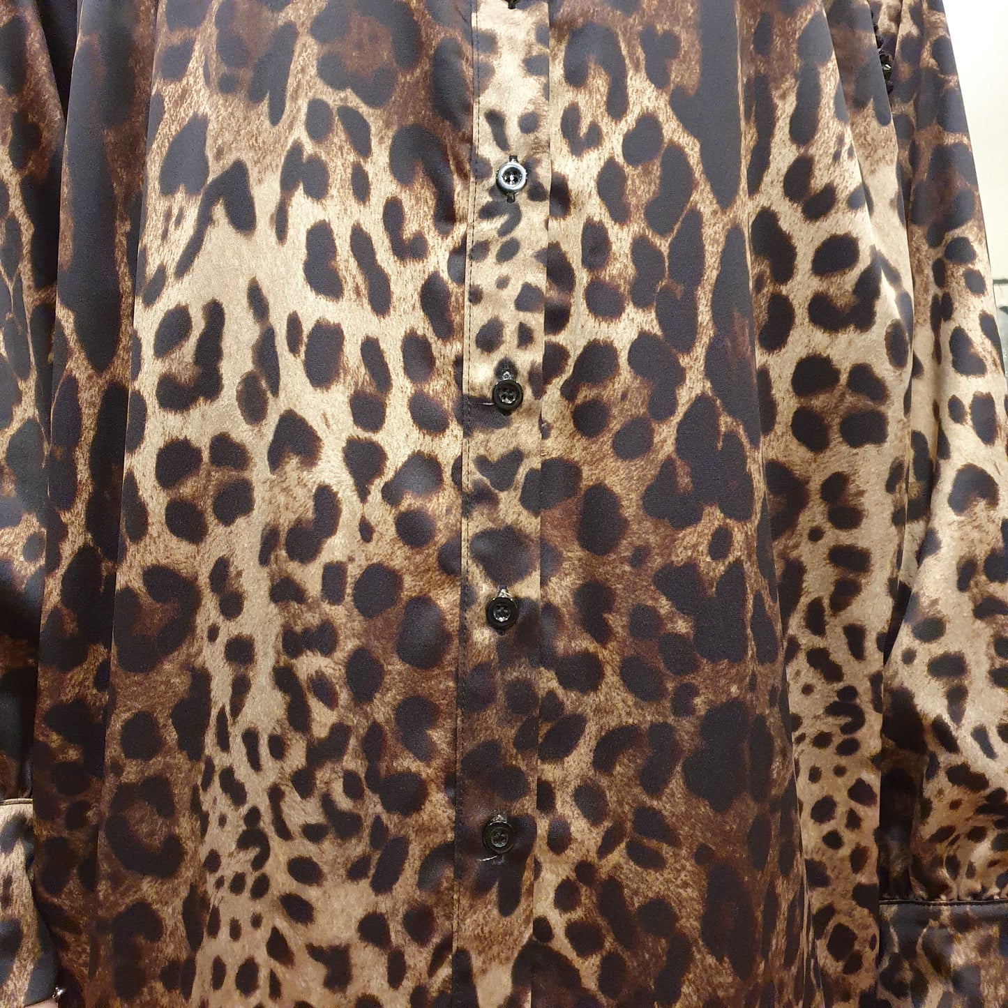 Abito maculato odi et amo