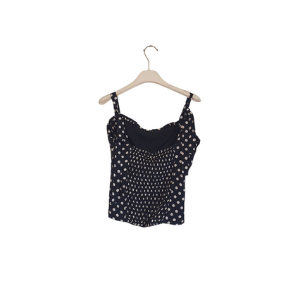 Top a pois con scollo a cuore