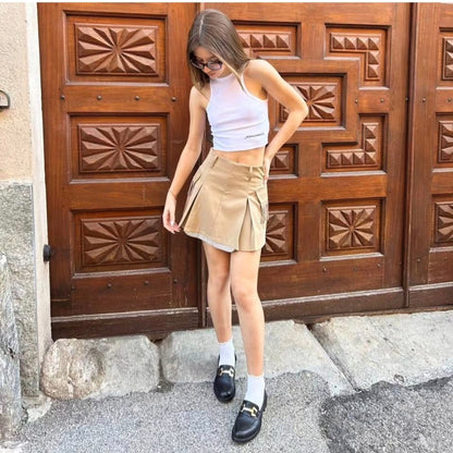 Gonna con tasche e frange beige