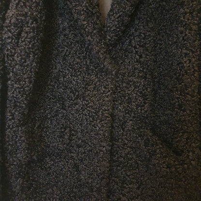 Teddy coat nero, perfetto per un inverno elegante a Fossano
